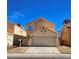 Charming two-story home featuring a two-car garage and neutral color palette in a well-maintained neighborhood at 4064 Browndeer Cir, Las Vegas, NV 89129