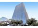 Striking full exterior view of a high-rise condo building with palms at 4471 Dean Martin Dr # 2605, Las Vegas, NV 89103