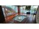 Inviting hot tub with stainless steel rails, a view of the adjacent pool and natural light at 4471 Dean Martin Dr # 2605, Las Vegas, NV 89103