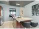 Modern kitchen with an island, stainless steel appliances, and convenient barstool seating at 4471 Dean Martin Dr # 2605, Las Vegas, NV 89103