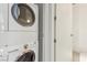 Functional laundry area with stacked washer and dryer at 4471 Dean Martin Dr # 2605, Las Vegas, NV 89103