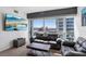 Cozy living room with a view, featuring modern furniture and city skyline views at 4471 Dean Martin Dr # 2605, Las Vegas, NV 89103