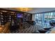A modern living room with a fireplace, sofas, bookshelves, and patterned floor at 4471 Dean Martin Dr # 2605, Las Vegas, NV 89103