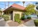 Exterior of a unit with desert landscaping, pool and address at 4706 Obannon Dr # C, Las Vegas, NV 89102