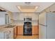 Kitchen with stainless steel appliances and tiled floor at 4706 Obannon Dr # C, Las Vegas, NV 89102