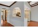Galley kitchen with tiled floors and ample cabinets as seen from the living room at 4706 Obannon Dr # C, Las Vegas, NV 89102