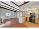 Combined living and kitchen space with white cabinets and an oven at 4706 Obannon Dr # C, Las Vegas, NV 89102
