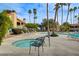 Inviting pool area featuring a jacuzzi and lounge chairs at 4706 Obannon Dr # C, Las Vegas, NV 89102
