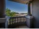 Balcony with stately columns offering neighborhood views and blue skies at 504 Pinnacle Heights Ln, Las Vegas, NV 89144