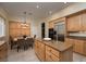 Bright kitchen with a center island, stainless steel appliances, and an eat in area at 504 Pinnacle Heights Ln, Las Vegas, NV 89144