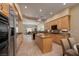 Spacious kitchen showcasing stainless steel appliances, a central island, and ample counter space at 504 Pinnacle Heights Ln, Las Vegas, NV 89144