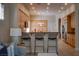 Open kitchen featuring modern countertops, bar seating, and stainless steel appliances at 504 Pinnacle Heights Ln, Las Vegas, NV 89144