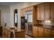 Well-equipped kitchen featuring stainless steel appliances, ample cabinet space, and granite countertops for meal preparation at 504 Pinnacle Heights Ln, Las Vegas, NV 89144