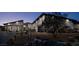 Striking single-story home featuring contemporary design, desert landscaping, and a stone-accented walkway, enhancing curb appeal at 5725 N Conquistador St, Las Vegas, NV 89149