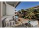 Inviting outdoor patio featuring comfortable seating, manicured landscaping, and a relaxing atmosphere for outdoor living at 5725 N Conquistador St, Las Vegas, NV 89149