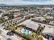 Overhead view of a beautiful home with a kidney-shaped pool, lovely landscaping, and a well-kept yard at 6206 Rio Camuy Ave, Las Vegas, NV 89131