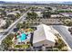 Picturesque home with a uniquely shaped pool, lush landscaping, and a private backyard retreat at 6206 Rio Camuy Ave, Las Vegas, NV 89131