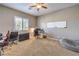 Bedroom featuring carpeted floors, white board and desk in this adaptable space at 6206 Rio Camuy Ave, Las Vegas, NV 89131
