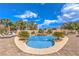 Beautiful backyard pool with lounge chairs and lush landscaping, creating a serene and private oasis at 6206 Rio Camuy Ave, Las Vegas, NV 89131