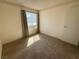 Carpeted bedroom offering natural light at 6412 Churchfield Blvd, Las Vegas, NV 89103