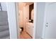 Stylish half-bathroom with vanity, mirror, decor and neutral tones, creating a fresh and clean aesthetic at 7403 Benlomond Ave, Las Vegas, NV 89179