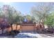 Charming two-story home featuring a well-maintained front yard and a two-car garage, offering curb appeal and convenience at 7403 Benlomond Ave, Las Vegas, NV 89179