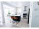 Bright kitchen boasts stainless steel appliances, tiled backsplash, and sleek countertops, perfect for culinary enthusiasts at 7403 Benlomond Ave, Las Vegas, NV 89179