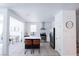 Bright kitchen boasts stainless steel appliances, tiled backsplash, and sleek countertops, perfect for culinary enthusiasts at 7403 Benlomond Ave, Las Vegas, NV 89179