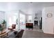 Open-concept living area features great flow to kitchen, sleek flooring, and plenty of natural light for a welcoming atmosphere at 7403 Benlomond Ave, Las Vegas, NV 89179