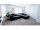 Inviting living room with modern furniture, a patterned rug, and plenty of natural light at 7403 Benlomond Ave, Las Vegas, NV 89179