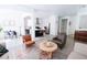 Open floor plan featuring a modern kitchen, dining area, and comfortable living space, perfect for entertaining at 7403 Benlomond Ave, Las Vegas, NV 89179