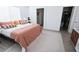 Spacious primary bedroom featuring a plush bed, soft decor, and access to closet and bathroom at 7403 Benlomond Ave, Las Vegas, NV 89179
