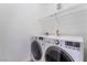 A laundry room with white washer and dryer units at 9000 Las Vegas Blvd # 1043, Las Vegas, NV 89123