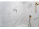 Shower features marble tile, rainfall shower head, and built-in niche at 9000 Las Vegas Blvd # 1043, Las Vegas, NV 89123