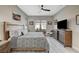 Cozy bedroom with stylish furnishings, ample natural light, and decorative wall art at 9940 Heather Moore Ave, Las Vegas, NV 89166