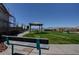 Community park with a bench and shaded picnic area at 9940 Heather Moore Ave, Las Vegas, NV 89166