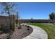 Community park featuring a walking path and landscaping at 9940 Heather Moore Ave, Las Vegas, NV 89166