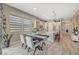 Dining area is open to the kitchen, creating a seamless flow for entertaining at 9940 Heather Moore Ave, Las Vegas, NV 89166