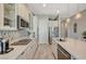 Bright kitchen features stainless appliances, a gas cooktop, and a modern tile backsplash at 9940 Heather Moore Ave, Las Vegas, NV 89166