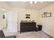 Neutral colored bedroom offers carpet, fan, dresser, and closet at 10316 Northern Hills Ave, Las Vegas, NV 89166