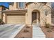 Beautful elevation with a two-car garage and and lovely entry at 10316 Northern Hills Ave, Las Vegas, NV 89166