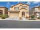 Charming two-story home with a well-maintained lawn and a two-car garage at 10316 Northern Hills Ave, Las Vegas, NV 89166