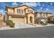 Charming two-story home with a well-maintained lawn and a two-car garage at 10316 Northern Hills Ave, Las Vegas, NV 89166