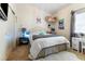 Cozy bedroom with plush rug, closet, desk and cute decor accents at 10638 La Spezia Way, Las Vegas, NV 89141