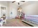 Spacious bedroom has carpeted floors, closet, and a nice view through the door at 10638 La Spezia Way, Las Vegas, NV 89141