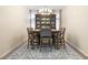 Formal dining room with modern decor, chandelier, and neutral color palette at 10638 La Spezia Way, Las Vegas, NV 89141