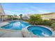 Beautiful backyard featuring a private pool and spa with a spacious patio area, perfect for outdoor relaxation at 10638 La Spezia Way, Las Vegas, NV 89141