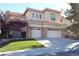 Charming two-story home featuring a three-car garage, desert landscaping, and a modern design at 10657 Blue Nile Ct, Las Vegas, NV 89144