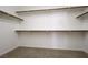 Spacious walk-in closet with multiple rods and shelves provides ample storage space at 10657 Blue Nile Ct, Las Vegas, NV 89144