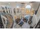 Aerial view of the grand great room with large windows and decorative chandeliers at 117 Milton Ct, Boulder City, NV 89005